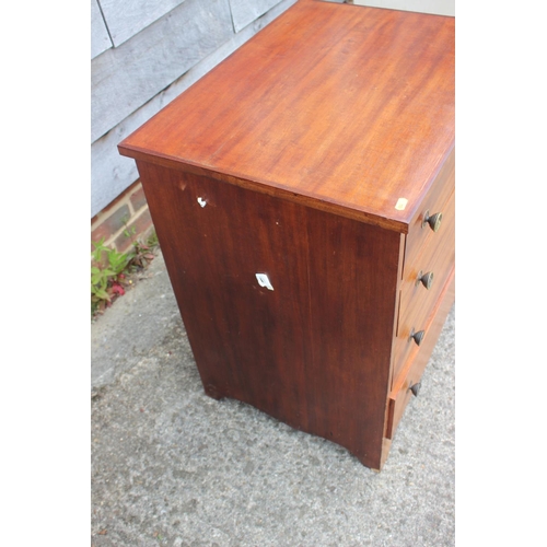 699 - A pine chest of four long drawers with brass knob handles, 25