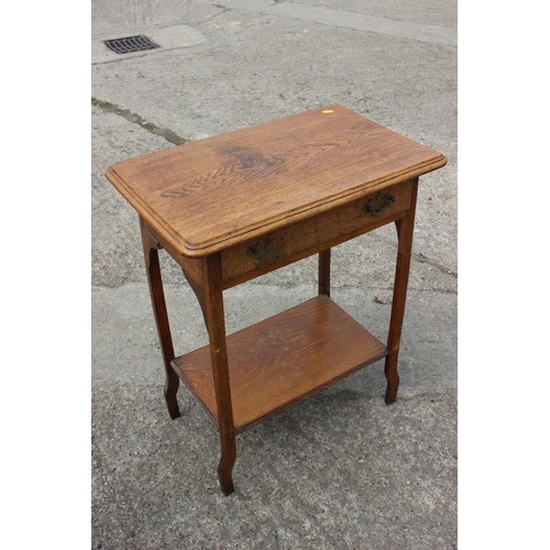 645 - An oak and embossed copper log bin, 17 1/2