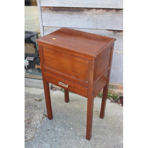 628 - A 1940s oak sewing box with silk lined interior, on slender supports, 13