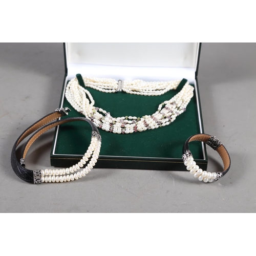 357 - A freshwater pearl mutli-strand necklace, in box, a similar faux pearl and leather choker necklace a... 