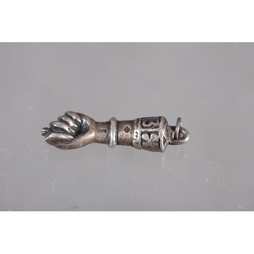 378 - A white metal pendant charm, formed as a Mano Figa, 1 1/4