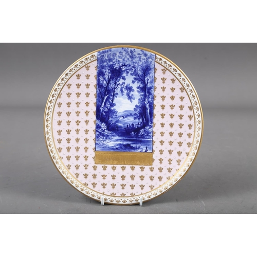 46 - A Davenport plate with blue and white landscape decoration and gilt fleur-de-lys border on a pink gr... 