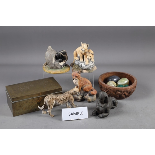 47 - A quantity of mostly Border Fine Arts composition model animals, a spelter model Sphinx, two malachi... 