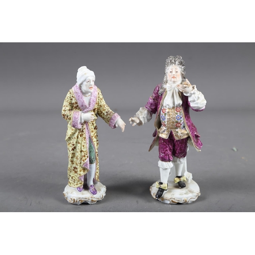 52 - Two 19th century Continental porcelain figures, by Joseph Schachter?, a pair of Bohemia red coloured... 