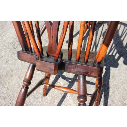 539 - A pair of Windsor yew target splat back dining chairs with elm panel seats, on turned and stretchere... 