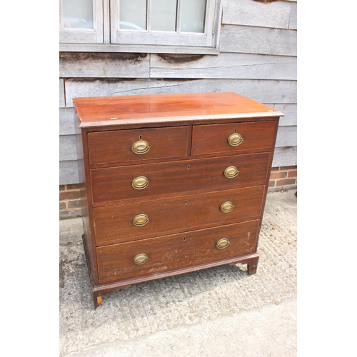 544 - A 19th century mahogany chest of two short and three long drawers with stamped oval bronze handles, ... 