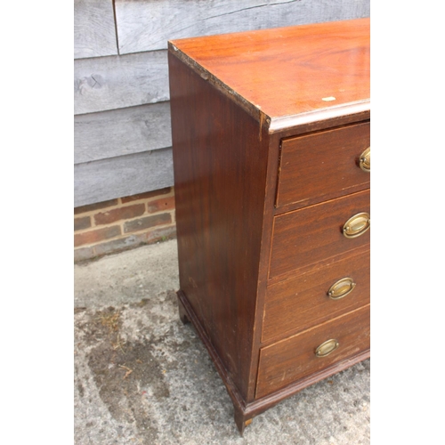 544 - A 19th century mahogany chest of two short and three long drawers with stamped oval bronze handles, ... 