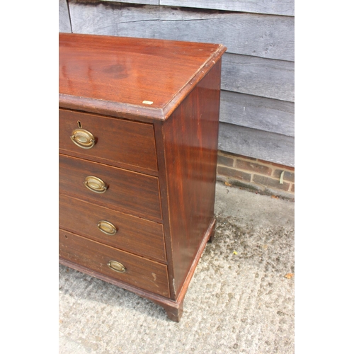 544 - A 19th century mahogany chest of two short and three long drawers with stamped oval bronze handles, ... 