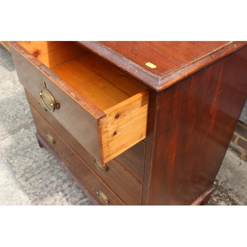 544 - A 19th century mahogany chest of two short and three long drawers with stamped oval bronze handles, ... 