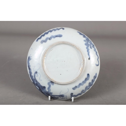 55 - A Chinese blue and white shaped edge plate with floral decoration, 10 1/2