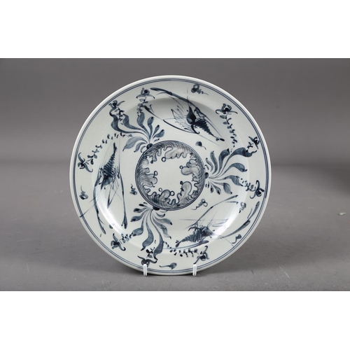 55 - A Chinese blue and white shaped edge plate with floral decoration, 10 1/2