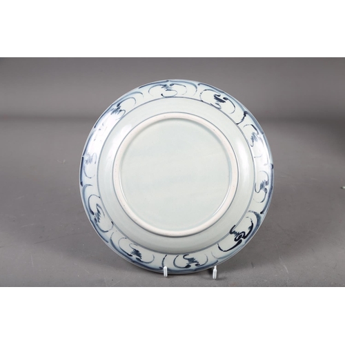 55 - A Chinese blue and white shaped edge plate with floral decoration, 10 1/2