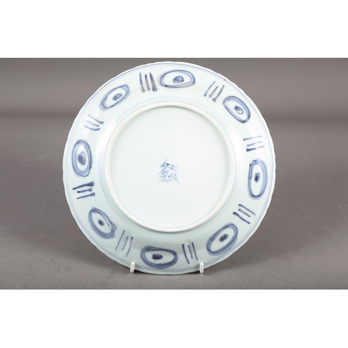 55 - A Chinese blue and white shaped edge plate with floral decoration, 10 1/2