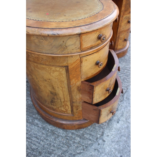 556 - A late 19th century figured walnut kidney-shaped double pedestal desk with tooled leather lined top,... 