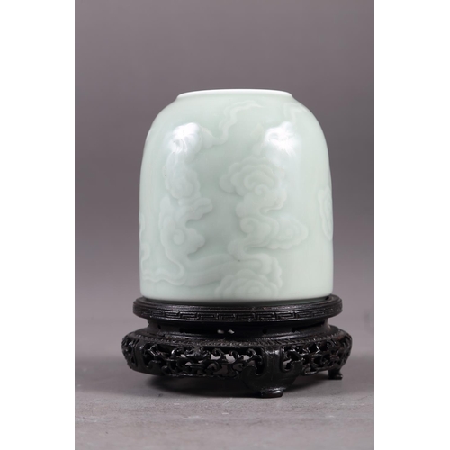 58 - A Chinese celadon glazed brush washer with cloud decoration and six-character mark to base, 4 3/4