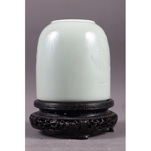 58 - A Chinese celadon glazed brush washer with cloud decoration and six-character mark to base, 4 3/4