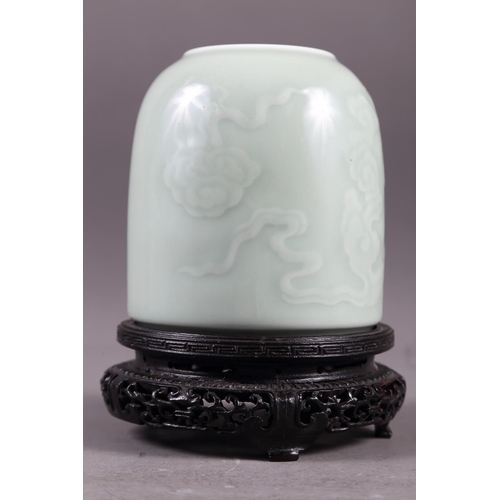 58 - A Chinese celadon glazed brush washer with cloud decoration and six-character mark to base, 4 3/4