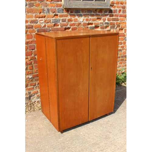 590 - A 1960s teak home office cabinet with fitted interior, pull-out writing surface, adjustable lamp, sh... 