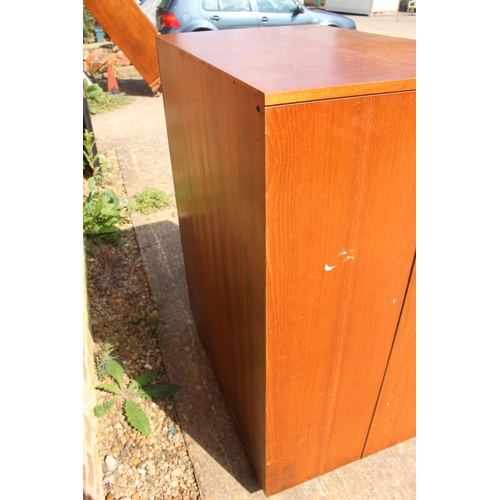 590 - A 1960s teak home office cabinet with fitted interior, pull-out writing surface, adjustable lamp, sh... 