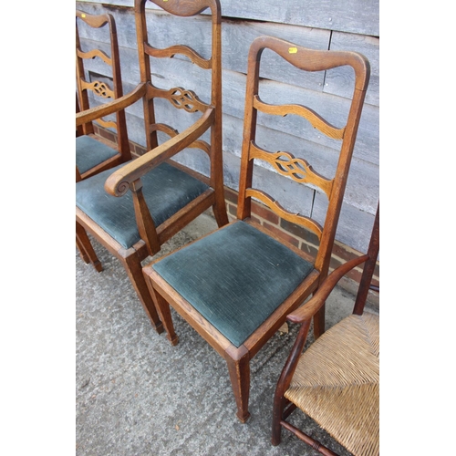 602 - A set of five Arts & Crafts oak ladder back dining chairs with drop-in seats, on square taper su... 