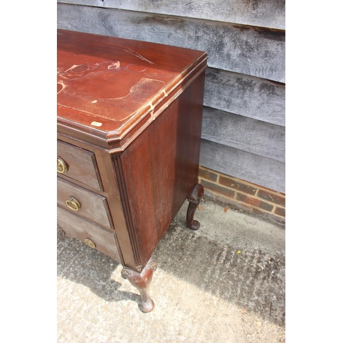 635 - A walnut chest of three long drawers with ring handles, on cabriole supports, 32