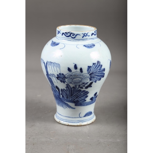 64 - A Chinese blue and white baluster vase with dragon and flower decoration, four-character mark to bas... 