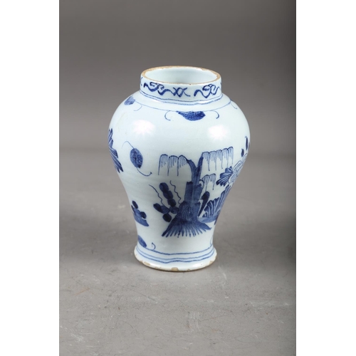 64 - A Chinese blue and white baluster vase with dragon and flower decoration, four-character mark to bas... 