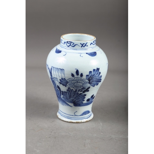 64 - A Chinese blue and white baluster vase with dragon and flower decoration, four-character mark to bas... 