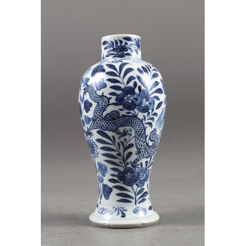 64 - A Chinese blue and white baluster vase with dragon and flower decoration, four-character mark to bas... 