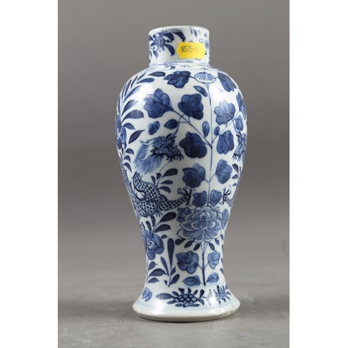 64 - A Chinese blue and white baluster vase with dragon and flower decoration, four-character mark to bas... 