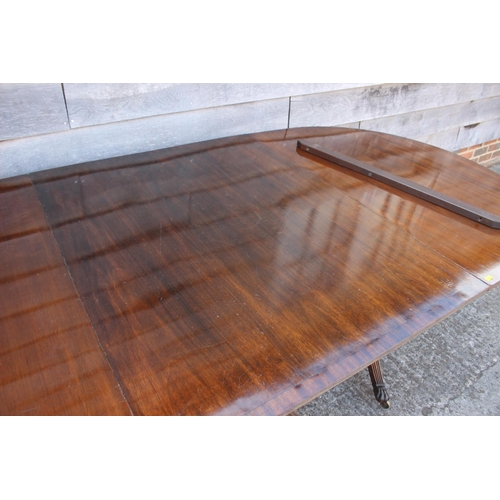 647 - A mahogany and banded triple pedestal dining table with two extra leaves, on turned columns and spla... 