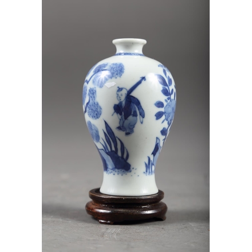 65 - A Chinese blue and white meiping vase with figure on horseback in a landscape decoration, 4 1/4