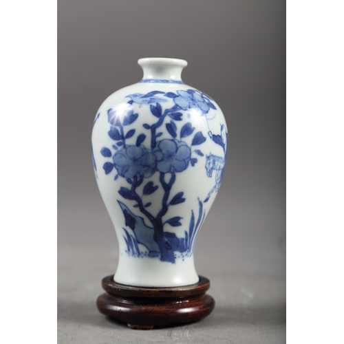 65 - A Chinese blue and white meiping vase with figure on horseback in a landscape decoration, 4 1/4