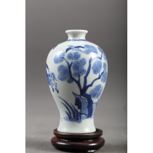 65 - A Chinese blue and white meiping vase with figure on horseback in a landscape decoration, 4 1/4