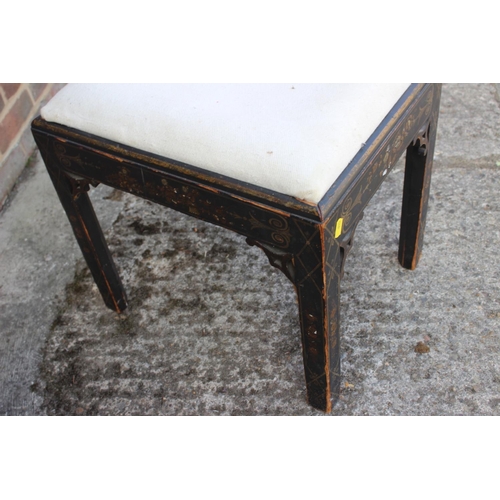 650 - A chinoiserie lacquered drop seat stool, on chamfered supports, 18 1/2