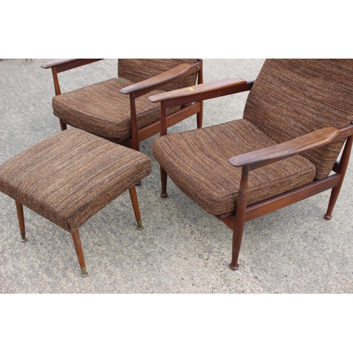 669 - A 1960s teak showframe three-seat settee and a pair of matching adjustable armchairs, together with ... 