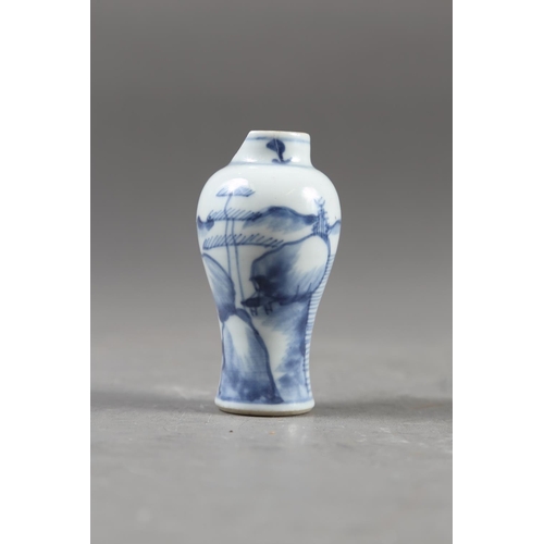 67 - A Chinese blue, white and iron oxide glazed cylindrical miniature vase with warriors in a landscape ... 