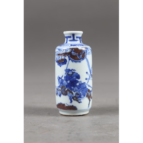 67 - A Chinese blue, white and iron oxide glazed cylindrical miniature vase with warriors in a landscape ... 