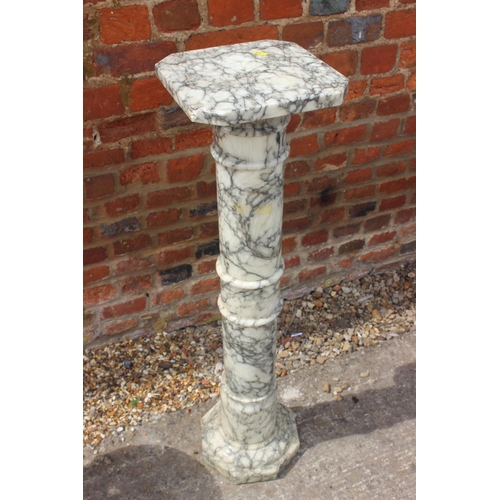 672 - A grey marble column, 10