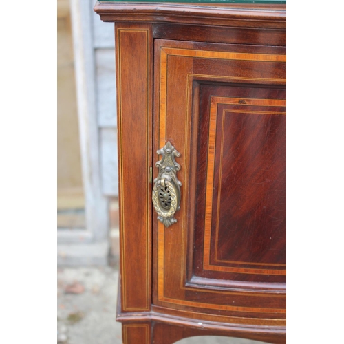 678 - A pair of Edwardian mahogany and kingwood banded bowfront bedside cupboards, on square taper support... 