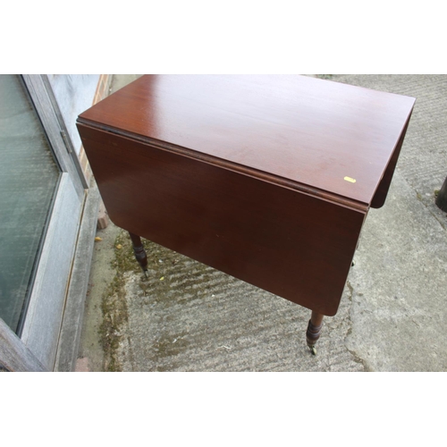 679 - An Edwardian mahogany Pembroke table, fitted one drawer, on turned and castored supports, 32 1/2