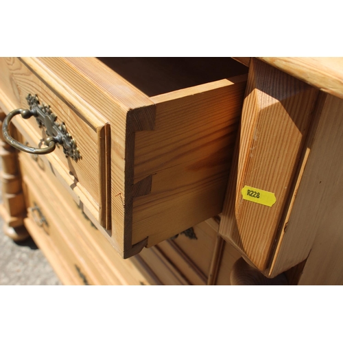 694 - A 19th century Continental waxed pine chest of four long drawers with brass handles, 38