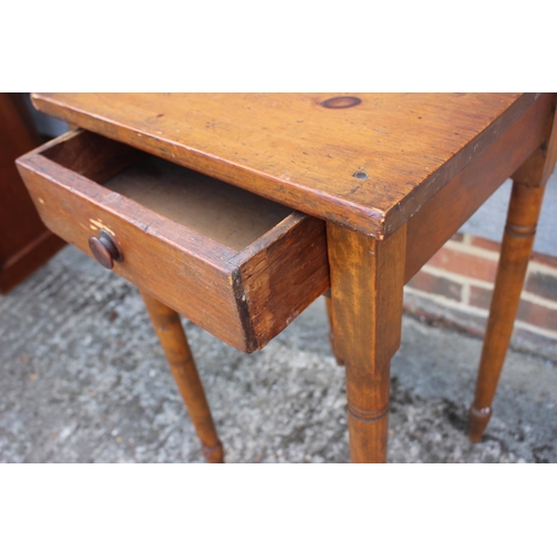 696 - A waxed pine side table, fitted one drawer, on turned supports, 17