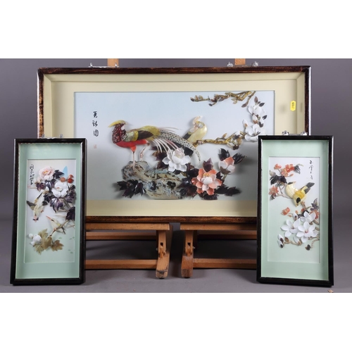 93 - Three Chinese carved shell panels of birds amongst flowers, largest 11