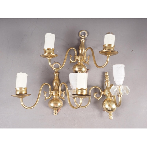 176 - A five-light cut glass chandelier, a pair of gilt wall lights and one other light