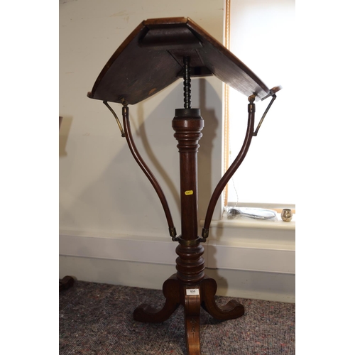 535 - A Swan and Millican Patent Choral and Band oak adjustable table, on turned column and tripod splay s... 