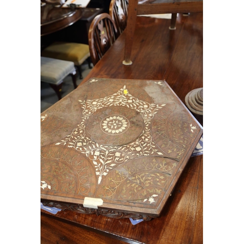 571 - An Indian? hardwood, bone and brass inlaid shape top occasional table, on trefoil base, 25