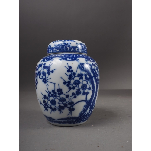 76 - A Chinese cylindrical vase with bird in a landscape decoration (damaged), a pair of blue and white p... 