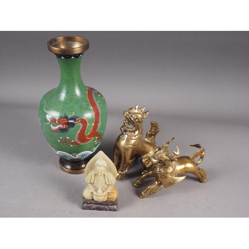 90 - *A cloisonne vase with dragon decoration on a green ground, 9 1/2