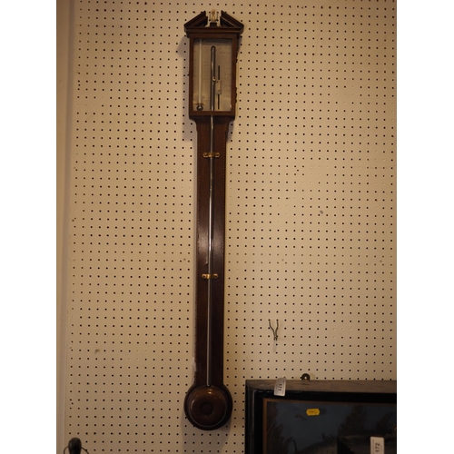 99 - An early 19th century walnut stick barometer with vernier by James Lillia